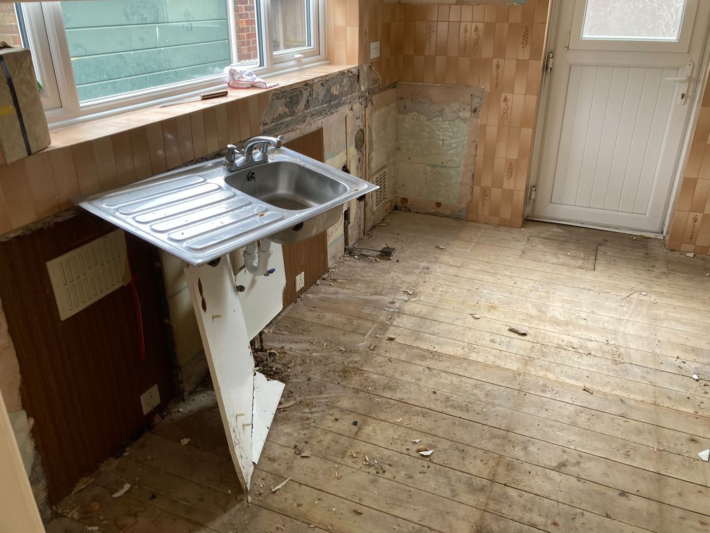 The same kitchen stripped out and cleared